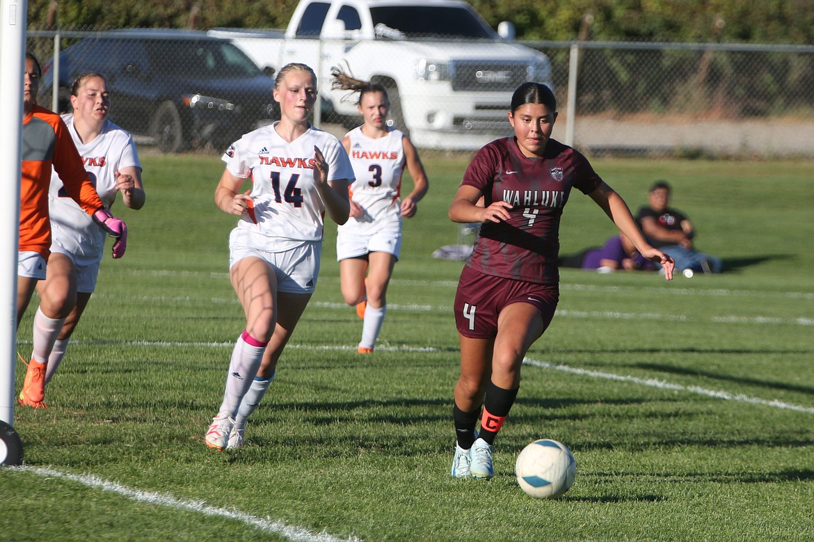 Wahluke sophomore Ashya Erazo (4) chases after a deflected ball during the second half against College Place on Tuesday. Erazo finished the match with a hat trick.