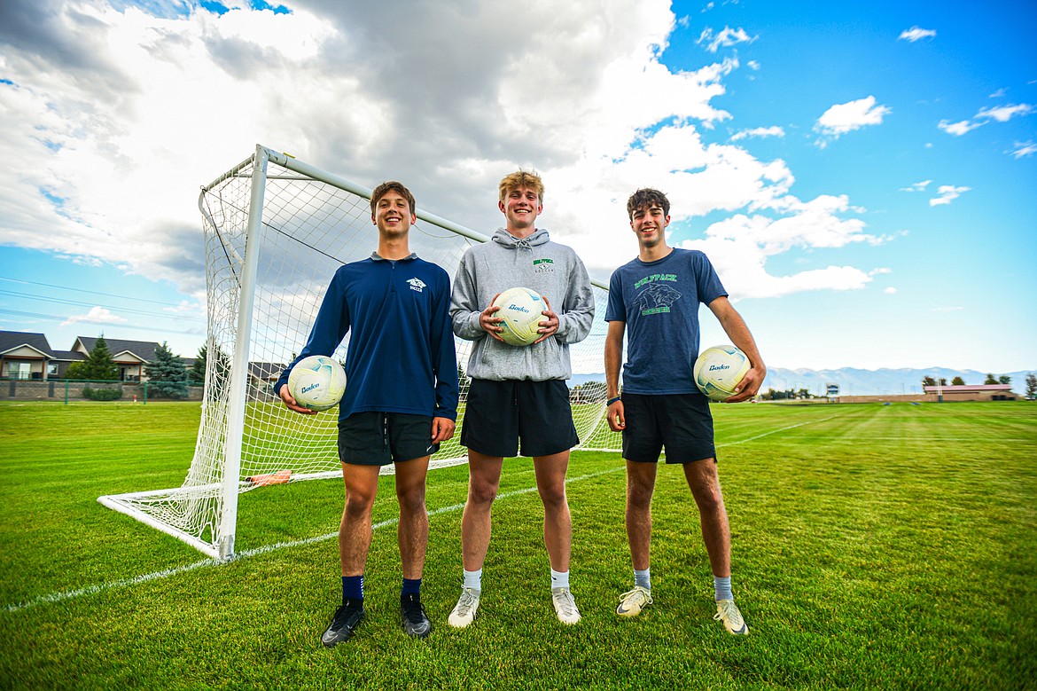 Glacier Wolfpack seniors Elias Holly, Liam Ells and Bryce Remley at practice on Wednesday, Sept. 25. (Casey Kreider/Daily Inter Lake)