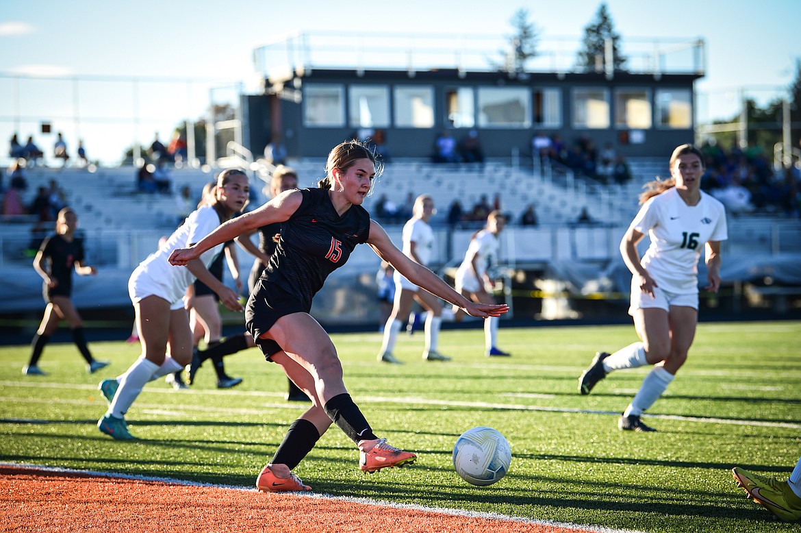 Flathead's Adeline Schneider (15) clears the ball out of the Bravettes' zone in the first half against Glacier at Legends Stadium on Thursday, Sept. 26. (Casey Kreider/Daily Inter Lake)