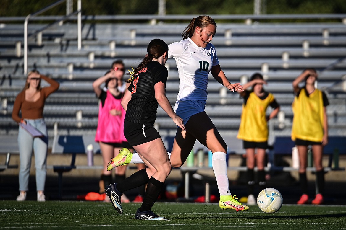 Glacier's Gracie Winkler (10) pushes the ball upfield against Flathead at Legends Stadium on Thursday, Sept. 26. (Casey Kreider/Daily Inter Lake)