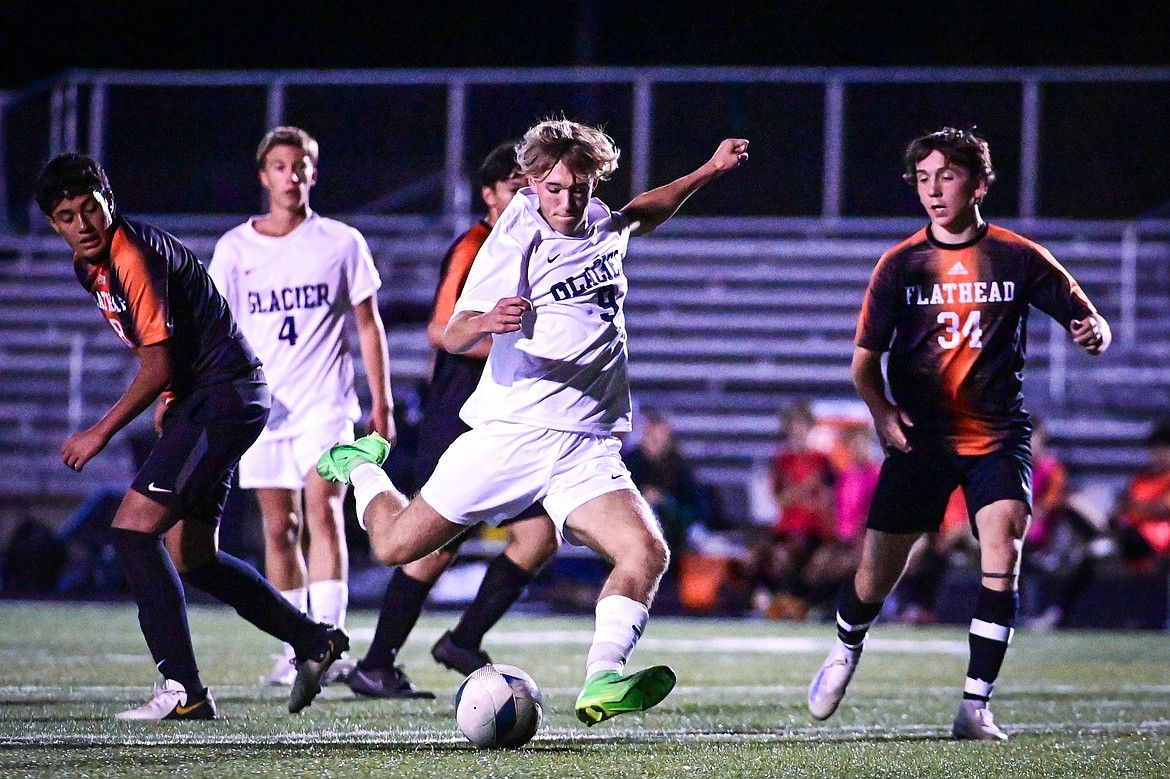 Glacier's AJ Zlogar (9) scores a goal in the first half against Flathead at Legends Stadium on Thursday, Sept. 26. (Casey Kreider/Daily Inter Lake)