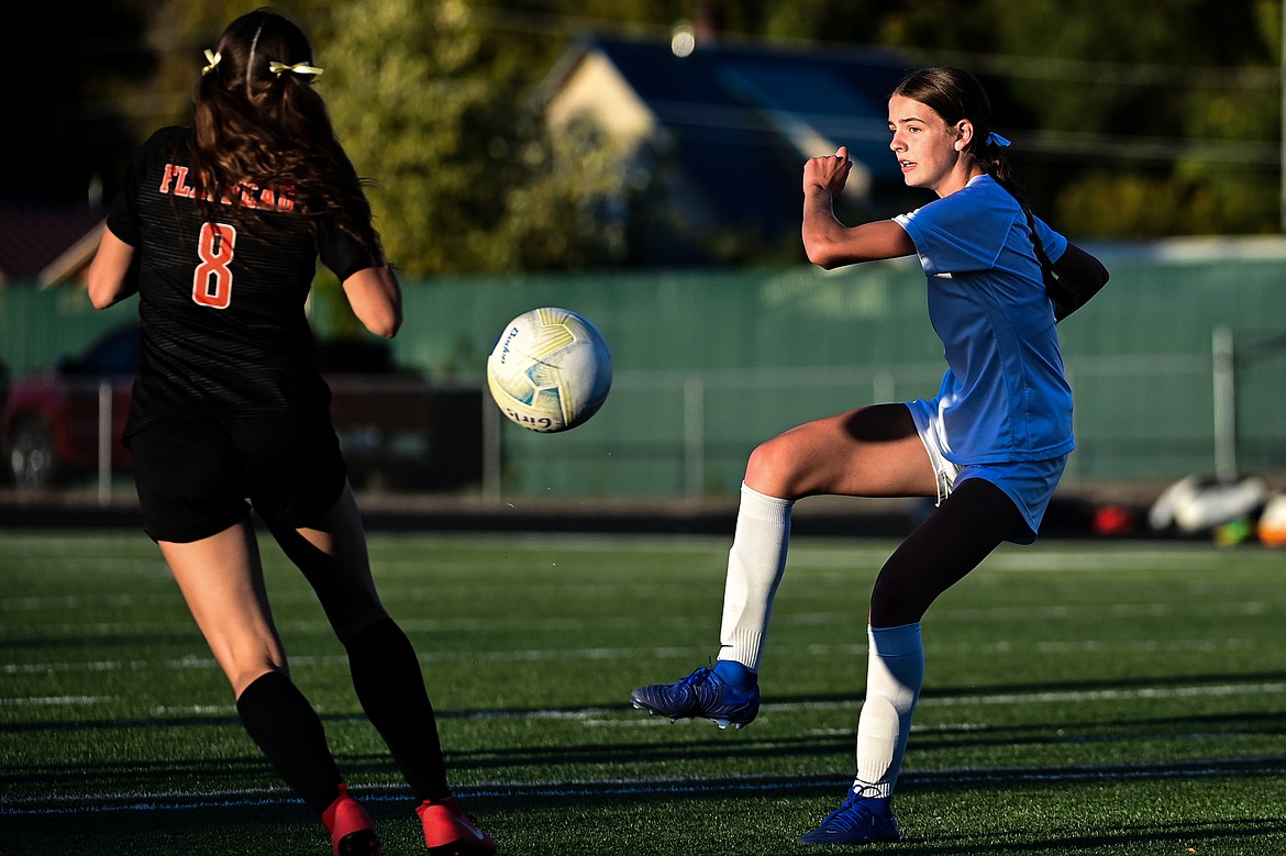 Glacier's Addison Brisendine (15) passes to a teammate against Flathead at Legends Stadium on Thursday, Sept. 26. (Casey Kreider/Daily Inter Lake)