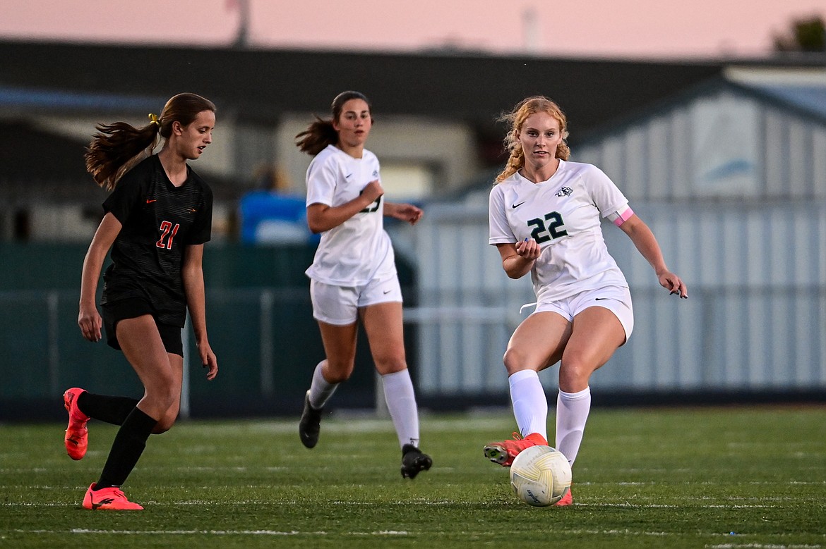 Glacier's Reese Ramey (22) passes to a teammate in the second half against Flathead at Legends Stadium on Thursday, Sept. 26. (Casey Kreider/Daily Inter Lake)