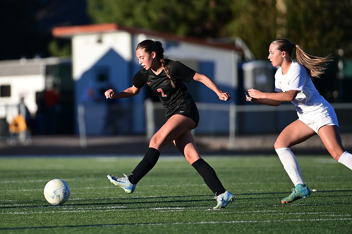 Flathead's Ava Sund (2) passes to a teammate against Glacier at Legends Stadium on Thursday, Sept. 26. (Casey Kreider/Daily Inter Lake)