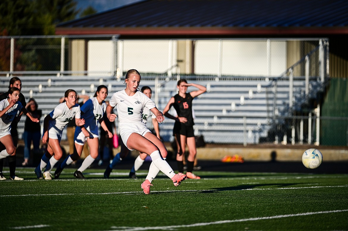 Glacier's Neve Travis (5) scores a goal on a penalty kick in the first half against Flathead at Legends Stadium on Thursday, Sept. 26. (Casey Kreider/Daily Inter Lake)