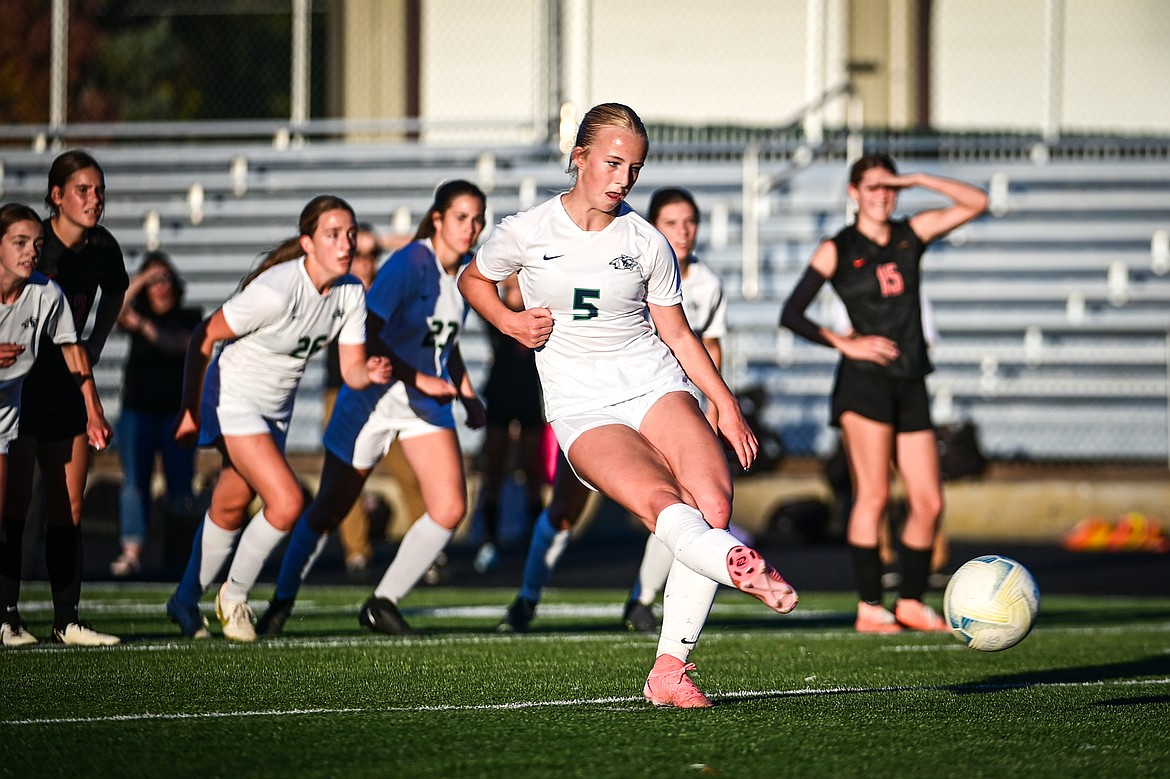 Glacier's Neve Travis (5) scores a goal on a penalty kick in the first half against Flathead at Legends Stadium on Thursday, Sept. 26. (Casey Kreider/Daily Inter Lake)