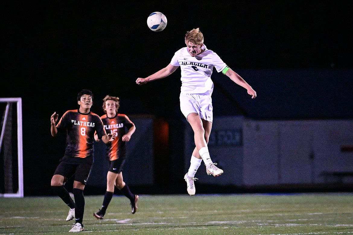 Glacier's Liam Ells (6) heads a ball in the first half against Flathead at Legends Stadium on Thursday, Sept. 26. (Casey Kreider/Daily Inter Lake)