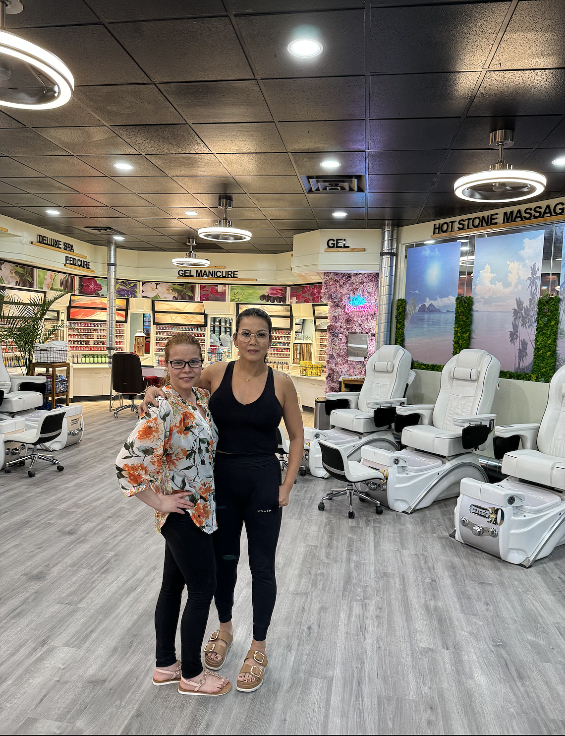 Orchid Nails & Spa staff Linda Ho (left) and owner Vivian Nguyen.