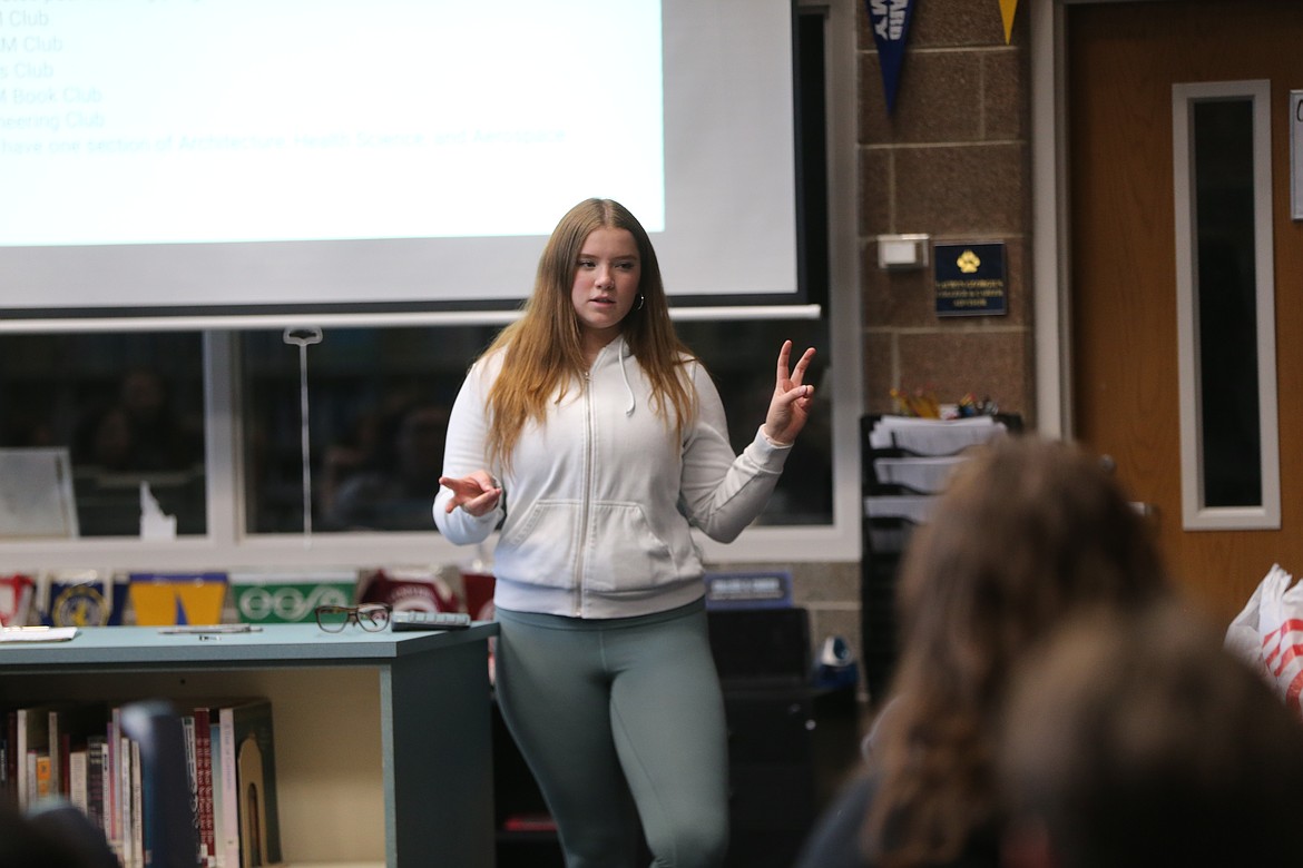 Coeur d'Alene High senior and Growing the STEM co-founder Adeline Smith provides guidance for her peers Thursday during a student coach training session.