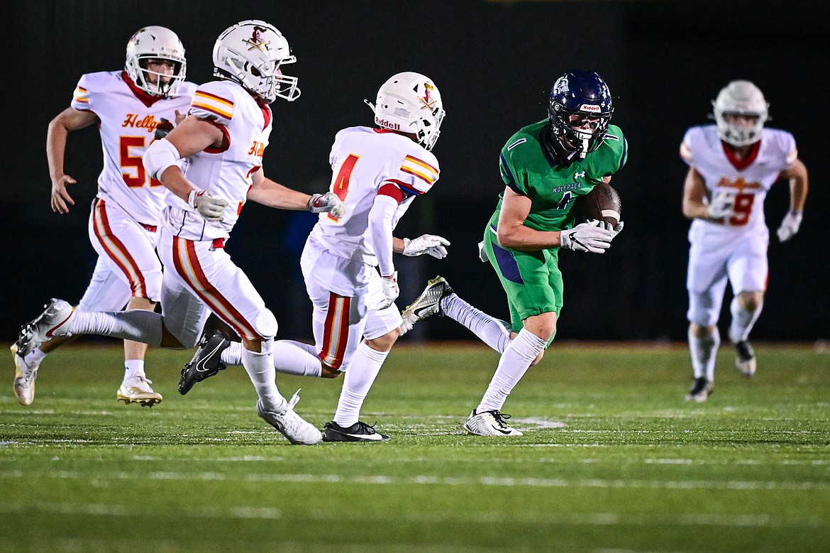 Glacier wide receiver Bridger Smith (1) picks up yardage after a reception in the second quarter against Missoula Hellgate at Legends Stadium on Friday, Sept. 27. (Casey Kreider/Daily Inter Lake)