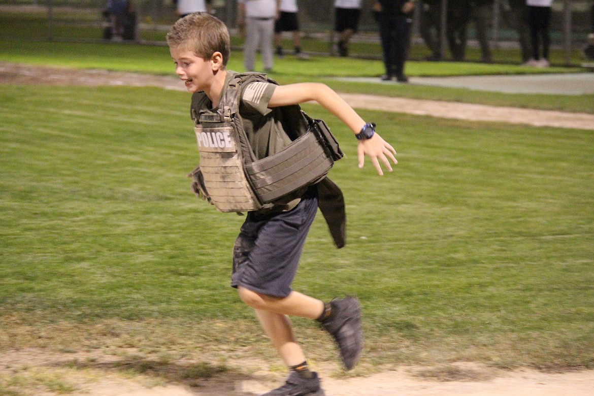 A relay race with tac vests was part of the annual Battle of Badge game.