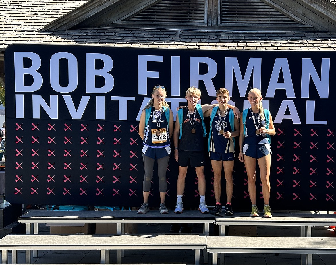 Courtesy photo
Athletes from Timberlake and Priest River High competed in the Division II race at the annual Bob Firman Invitational at Eagle Island State Park on Saturday. Athletes in each race received backpacks for finishing in the top 20. From left are Timberlake junior Vanessa McLachlan, Priest River senior Brayden Lamanna, Timberlake sophomore Caleb Royce and Timberlake sophomore Lola Eggleston.