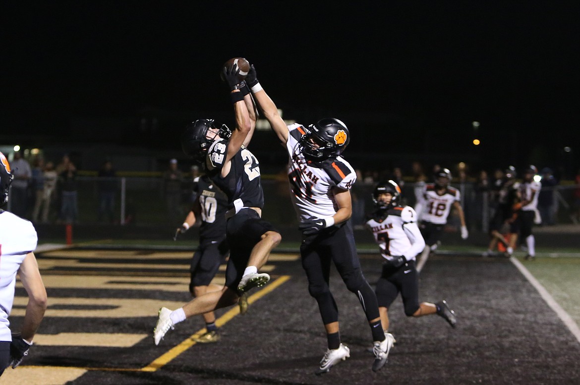 Royal junior Shea Stevenson (23) stretches out to haul in a touchdown pass during Friday’s game against Zillah. Stevenson caught seven passes for 101 yards and four touchdowns.