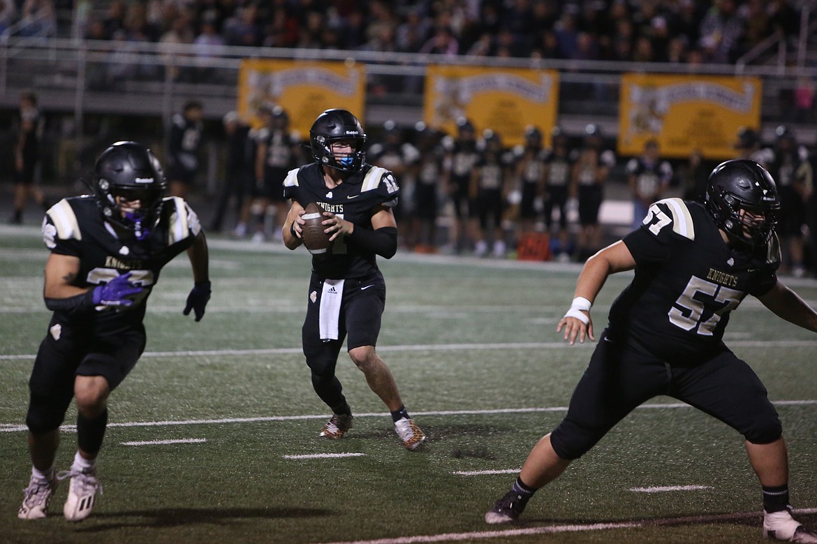 Royal senior Lance Allred (11) threw for 192 yards, four touchdowns and an interception in Friday’s game against Zillah. Allred added an addition touchdown on a one-yard run.