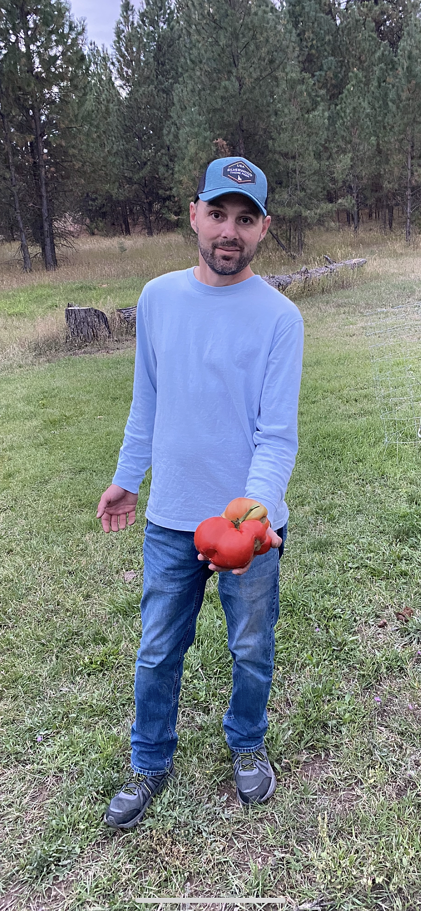 Joey Vigue, his wife Lauralee, and kids Leyna, Roczen and Layla, grew a huge 2.6-pound tomato this summer. (Photo provided)