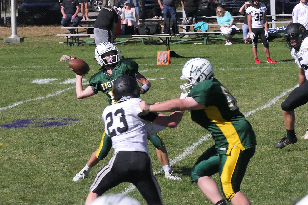 St. Regis quarterback Conner Lulis (10) launches a pass downfield during the Tigers game versus Seeley-Swan Saturday afternoon in St. Regis.  (Chuck Bandel/VP-MI)