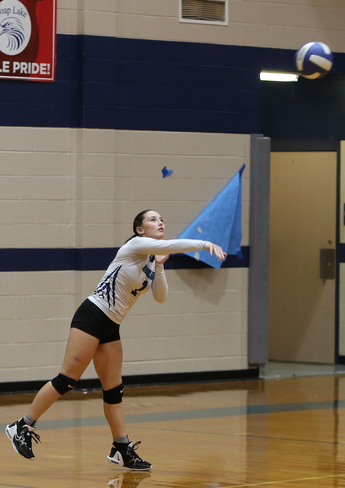 Soap Lake junior Mylee Dana (1) serves the ball during the second set against Republic on Saturday.