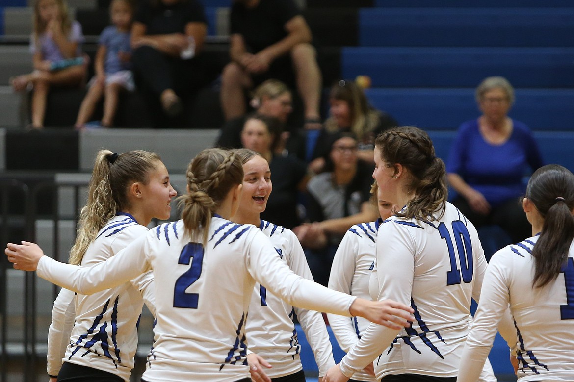 Soap Lake players celebrate after scoring a point during Saturday’s 3-0 win over Republic.