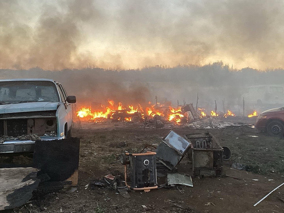 Adams County Fire District 5 responded to a fire at a homeless encampment on private property outside Othello at around 5:15 p.m. Sunday. The fire scorched two recreational vehicles, 13 vehicles and several piles of trash and tires.