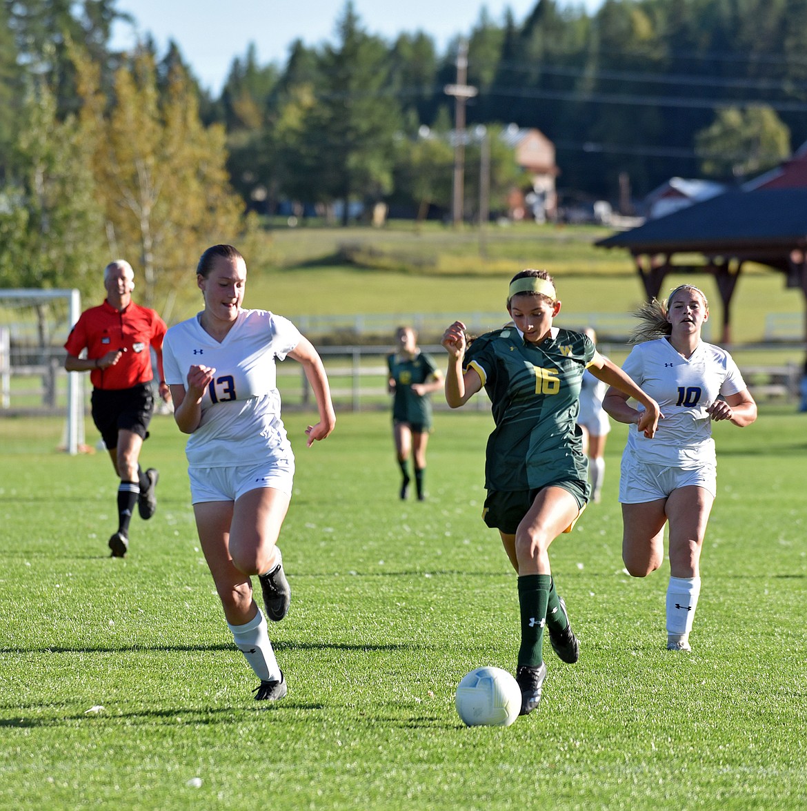 Whitefish's Grace Sliman races to be first to the ball at the game against Libby on Thursday. (Julie Engler/Whitefish Pilot)