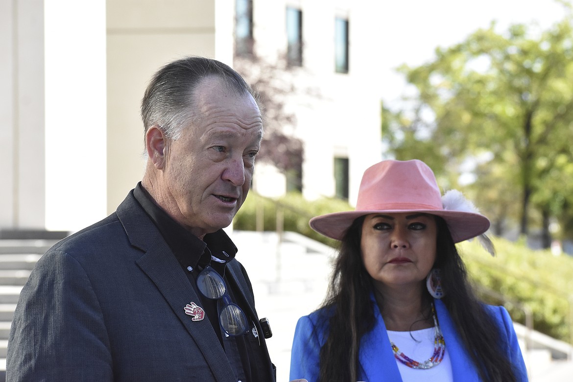 Bret Healy, left, a consultant for Four Directions Native Vote, Inc. and attorney Cher Old Elk speak about barriers to voting among Native Americans, at the James F. Battin Federal Courthouse, Sept. 26, 2024, in Billings, Mont. (AP Photo/Matthew Brown)