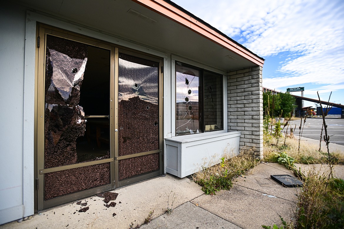 Shattered windows at the former Fairbridge Inn & Suites and Outlaw Convention Center in Kalispell on Tuesday, Oct. 1. (Casey Kreider/Daily Inter Lake)