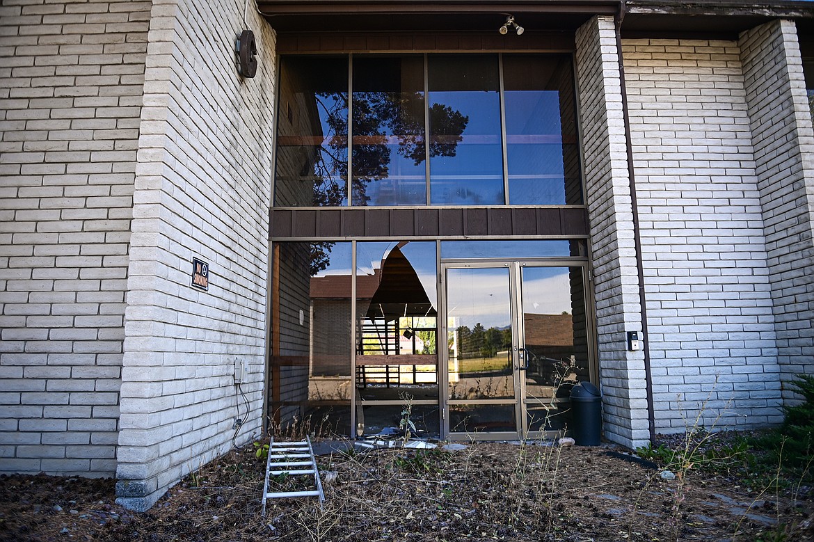 Shattered panes of glass at the former Fairbridge Inn & Suites and Outlaw Convention Center in Kalispell on Tuesday, Oct. 1. (Casey Kreider/Daily Inter Lake)