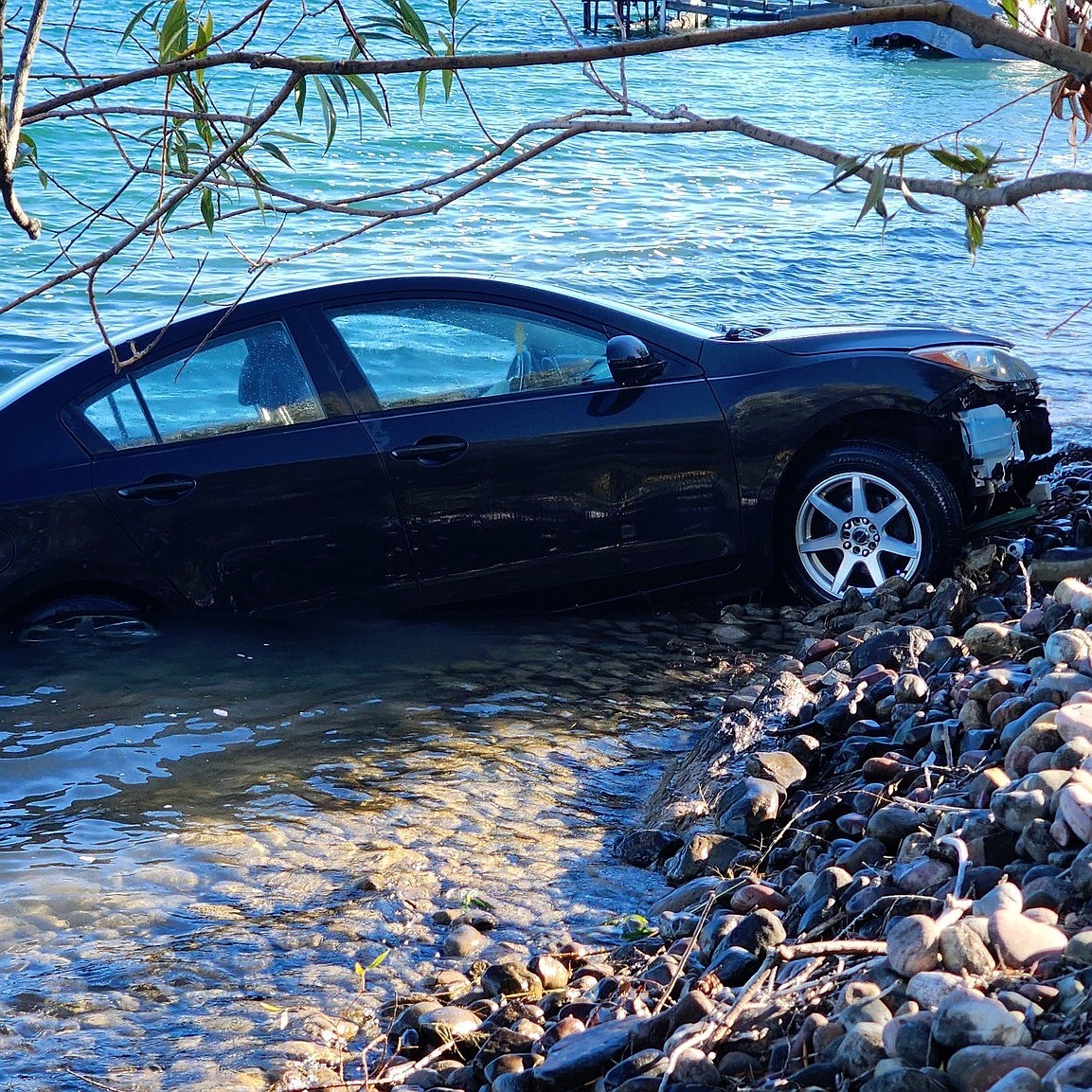 Car and driver rescued from river | Lake County Leader