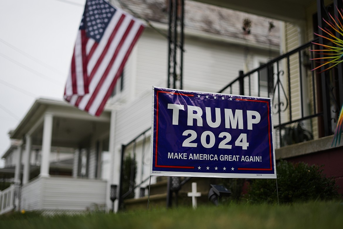 A sign supporting Republican presidential nominee former President Donald Trump is posted in Jim Hulings, chairman of the Butler County Republican Committee yard in Zelienople, Thursday, Sept. 26, 2024. (AP Photo/Matt Rourke)