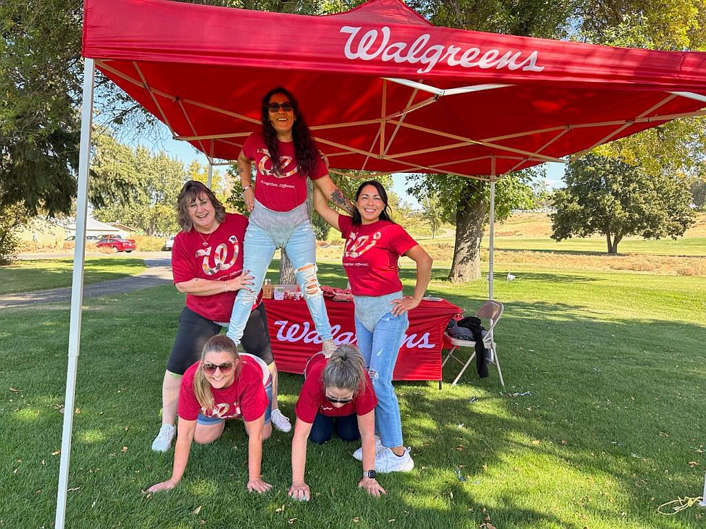 The Walgreens team shows off the latest fashion in adult diapers at the Dude, Where’s my Cart?! golf tournament Saturday. Top, from left: Lisa Phillips, Lorena Gonzalez, Conny Salazar. Bottom: Tracy Goff, Caroline Nelson.