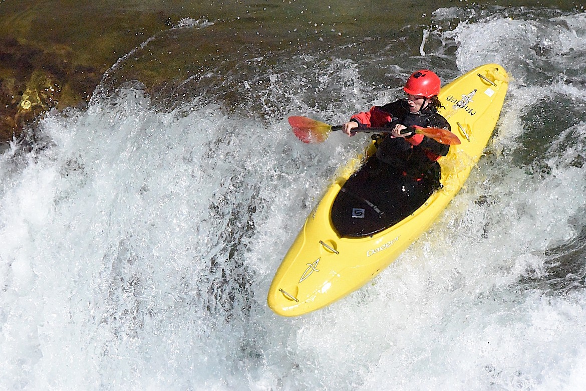 A kayaker goes over a waterfall on the Kootenai River Saturday, Sept. 21, 2024. (Scott Shindledecker/The Western News)