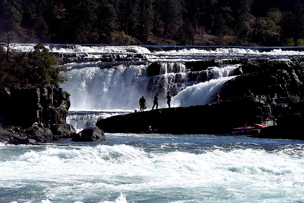 A trio of kayakers survey a section of the Kootenai River falls Saturday, Sept. 21, 2024. (Scott Shindledecker/The Western News)