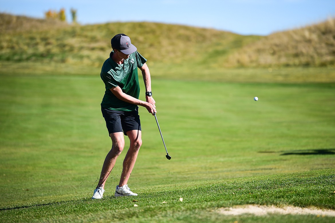 Glacier's Sam Engellant chips onto the twelfth green during the Class AA State Golf Tournament at Northern Pines Golf Club in Kalispell on Thursday, Oct. 3. (Casey Kreider/Daily Inter Lake)