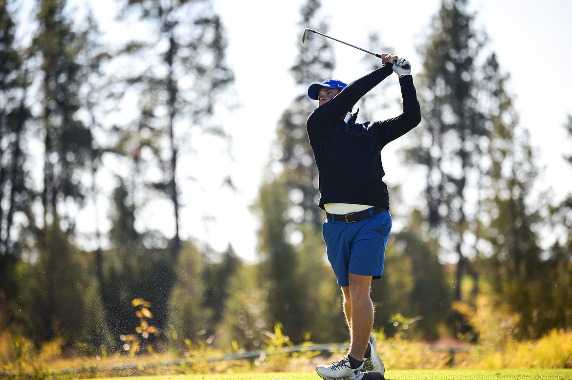 Gallatin's Cobe Sacry tees off on the thirteenth hole during the Class AA State Golf Tournament at Northern Pines Golf Club in Kalispell on Thursday, Oct. 3. (Casey Kreider/Daily Inter Lake)