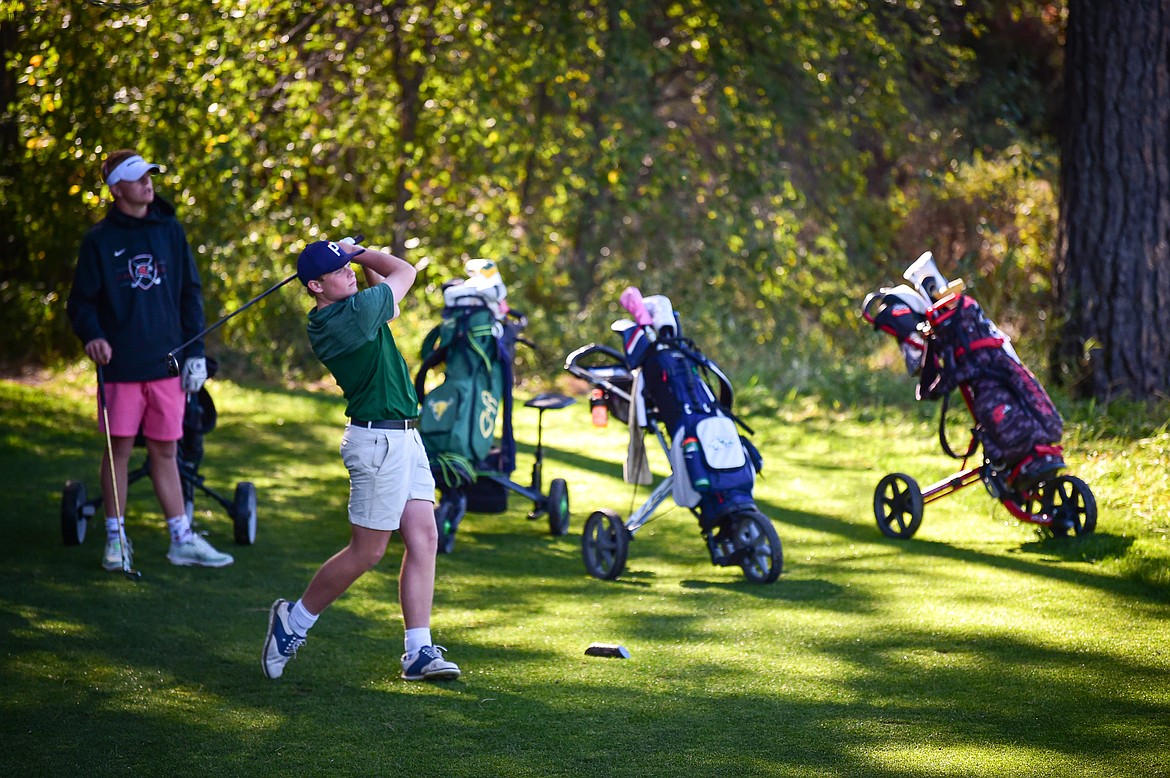 Glacier's Torren Murray tees off on the fourteenth hole during the Class AA State Golf Tournament at Northern Pines Golf Club in Kalispell on Thursday, Oct. 3. (Casey Kreider/Daily Inter Lake)