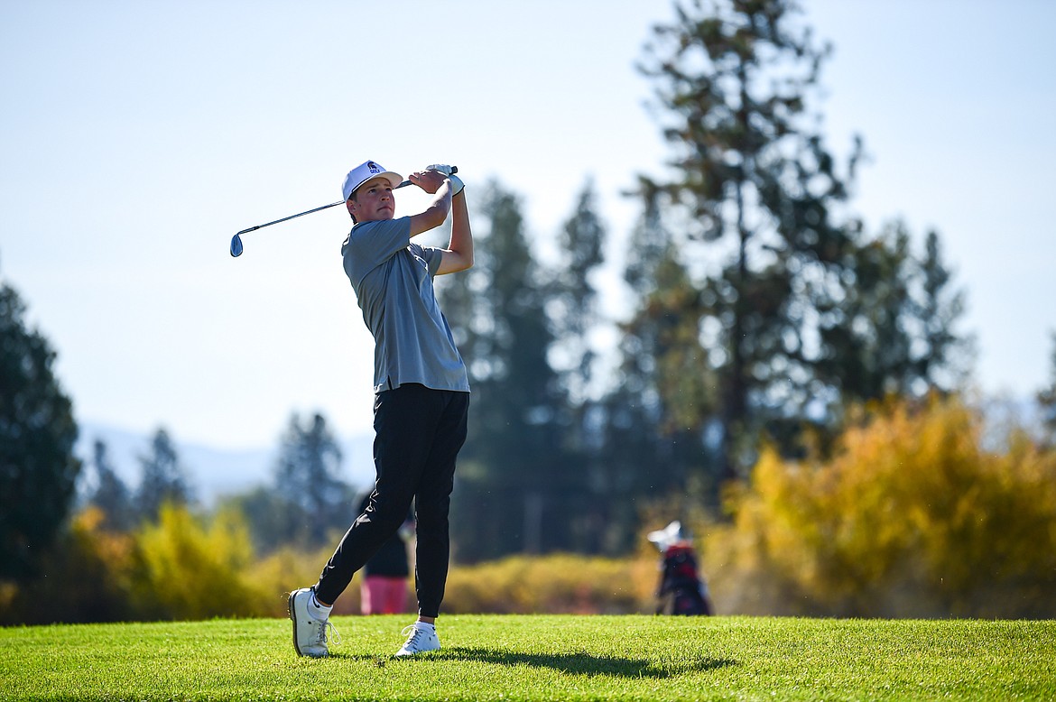 Missoula Sentinel's Hudson Goroski hits his approach on the fourteenth hole during the Class AA State Golf Tournament at Northern Pines Golf Club in Kalispell on Thursday, Oct. 3. (Casey Kreider/Daily Inter Lake)