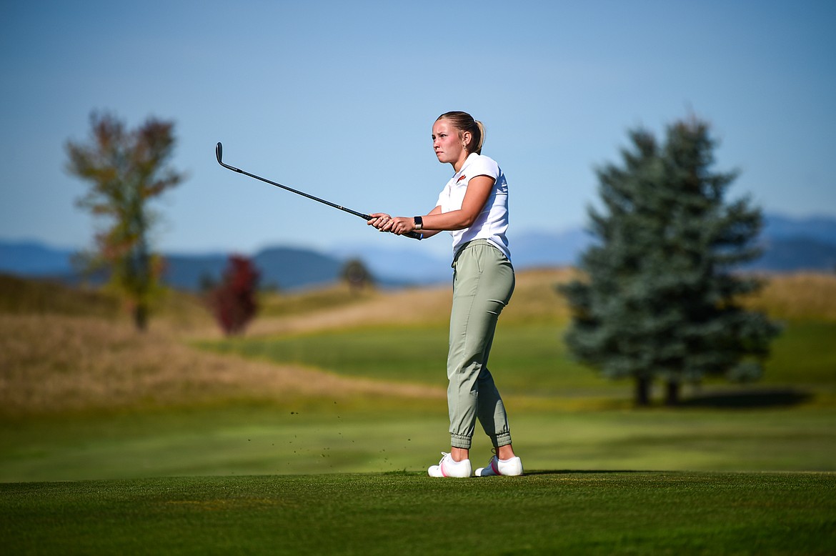 Flathead's Kyrie Gislason chips onto the fourth green during the Class AA State Golf Tournament at Northern Pines Golf Club in Kalispell on Thursday, Oct. 3. (Casey Kreider/Daily Inter Lake)