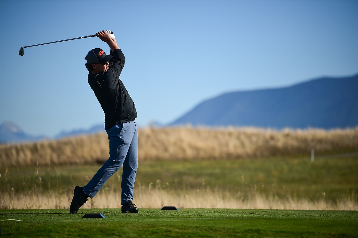 Flathead's Dylan Morris tees off on the eleventh hole during the Class AA State Golf Tournament at Northern Pines Golf Club in Kalispell on Thursday, Oct. 3. (Casey Kreider/Daily Inter Lake)