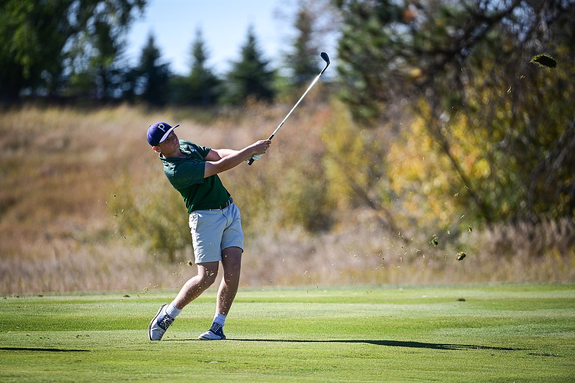 Glacier's Torren Murray hits his approach on the fourteenth hole during the Class AA State Golf Tournament at Northern Pines Golf Club in Kalispell on Thursday, Oct. 3. (Casey Kreider/Daily Inter Lake)