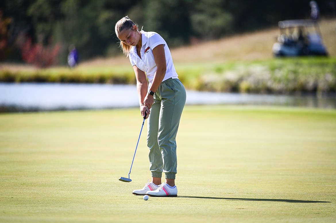 Flathead's Kyrie Gislason putts on the fourth green during the Class AA State Golf Tournament at Northern Pines Golf Club in Kalispell on Thursday, Oct. 3. (Casey Kreider/Daily Inter Lake)