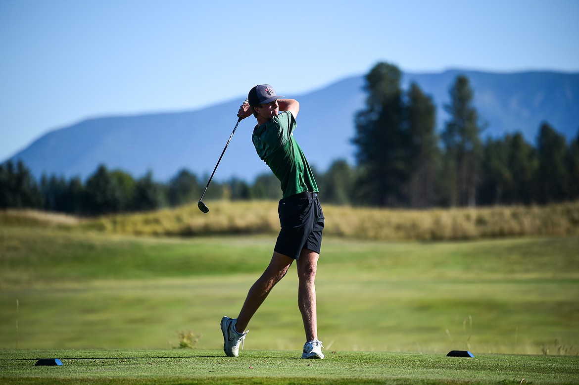 Glacier's Sam Engellant tees off on the twelfth hole during the Class AA State Golf Tournament at Northern Pines Golf Club in Kalispell on Thursday, Oct. 3. (Casey Kreider/Daily Inter Lake)