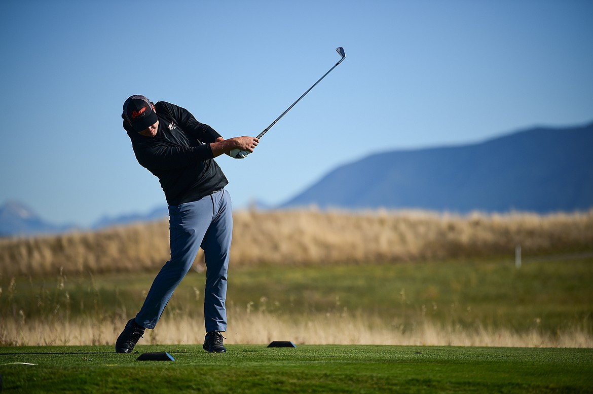 Flathead's Dylan Morris tees off on the eleventh hole during the Class AA State Golf Tournament at Northern Pines Golf Club in Kalispell on Thursday, Oct. 3. (Casey Kreider/Daily Inter Lake)