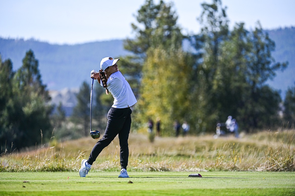 Billings Senior's Becca Washington tees off on the tenth hole during the Class AA State Golf Tournament at Northern Pines Golf Club in Kalispell on Thursday, Oct. 3. (Casey Kreider/Daily Inter Lake)