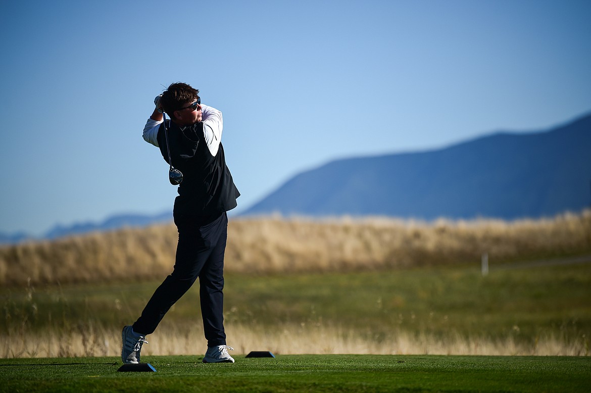 Billings West's Payton O'Neil tees off on the eleventh hole during the Class AA State Golf Tournament at Northern Pines Golf Club in Kalispell on Thursday, Oct. 3. (Casey Kreider/Daily Inter Lake)