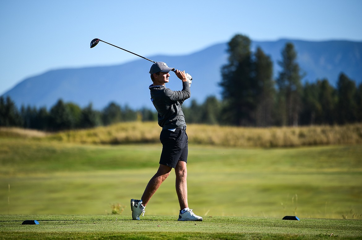 Billings Skyview's Isaac Mosser tees off on the twelfth hole during the Class AA State Golf Tournament at Northern Pines Golf Club in Kalispell on Thursday, Oct. 3. (Casey Kreider/Daily Inter Lake)