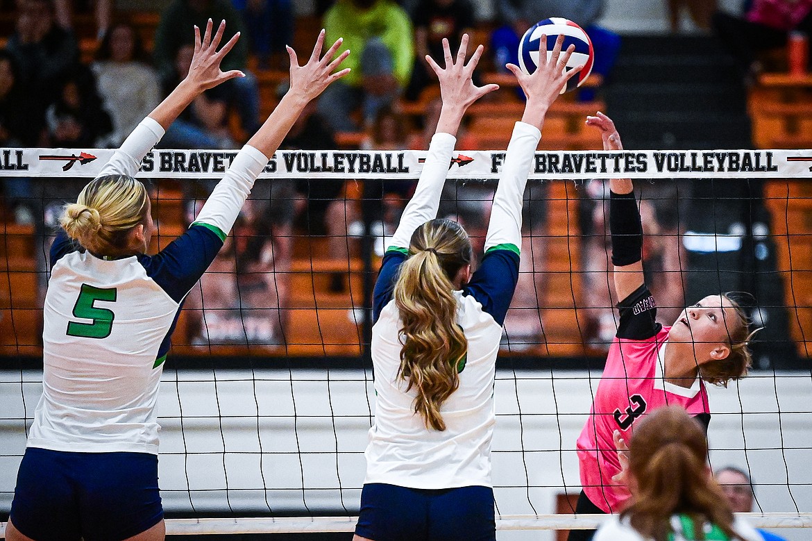 Flathead's Addi Smith (3) goes up to the net for a kill against Glacier at Flathead High School on Thursday, Oct. 3. (Casey Kreider/Daily Inter Lake)