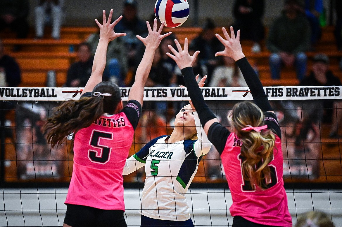 Glacier's Mali Carroll (5) goes up to the net for a kill against Flathead at Flathead High School on Thursday, Oct. 3. (Casey Kreider/Daily Inter Lake)