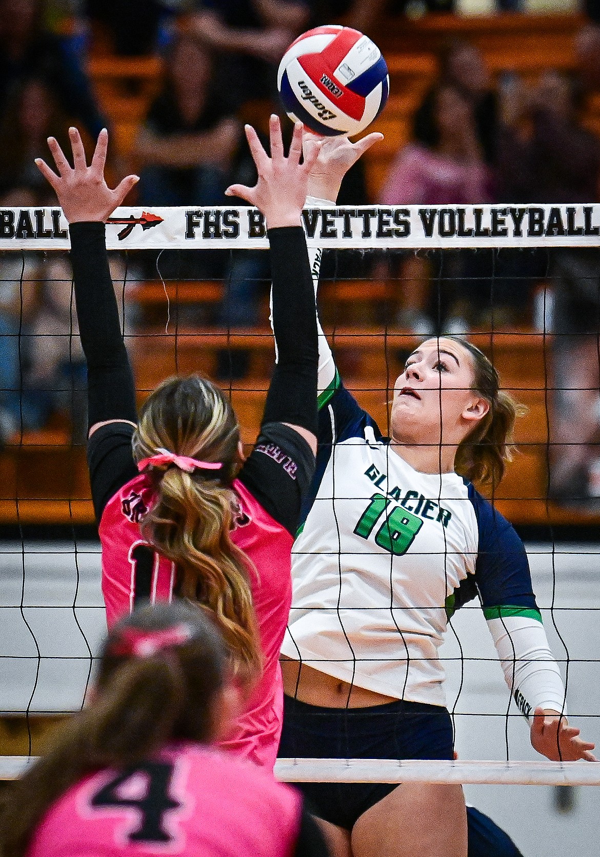 Glacier's Allie Krueger (18) goes up to the net for a kill against Flathead at Flathead High School on Thursday, Oct. 3. (Casey Kreider/Daily Inter Lake)