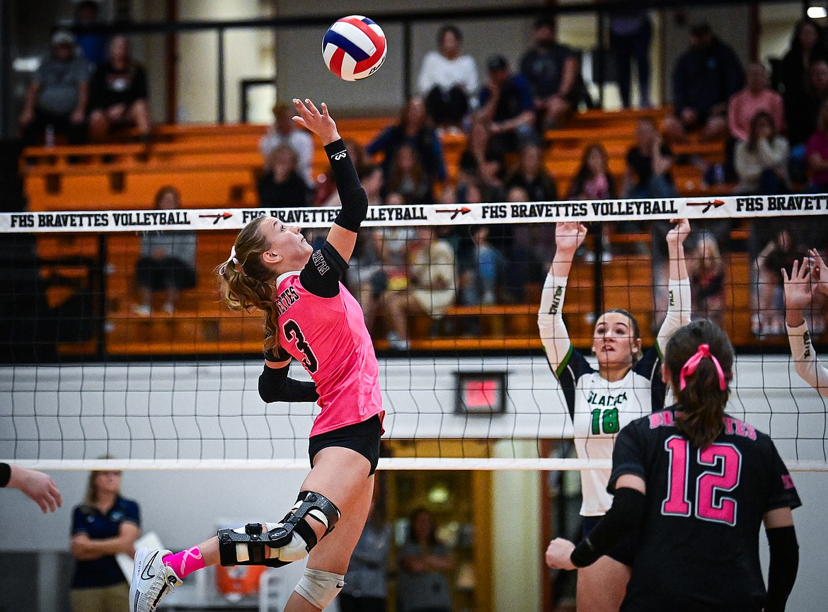 Flathead's Addi Smith (3) goes up to the net for a kill against Glacier at Flathead High School on Thursday, Oct. 3. (Casey Kreider/Daily Inter Lake)