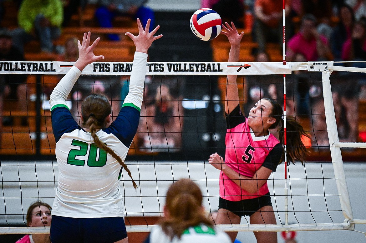 Flathead's Bristol Lenz (5) goes to the net for a kill against Glacier at Flathead High School on Thursday, Oct. 3. (Casey Kreider/Daily Inter Lake)